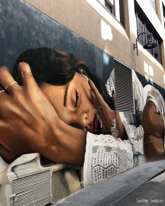 Melbourne street art woman hands